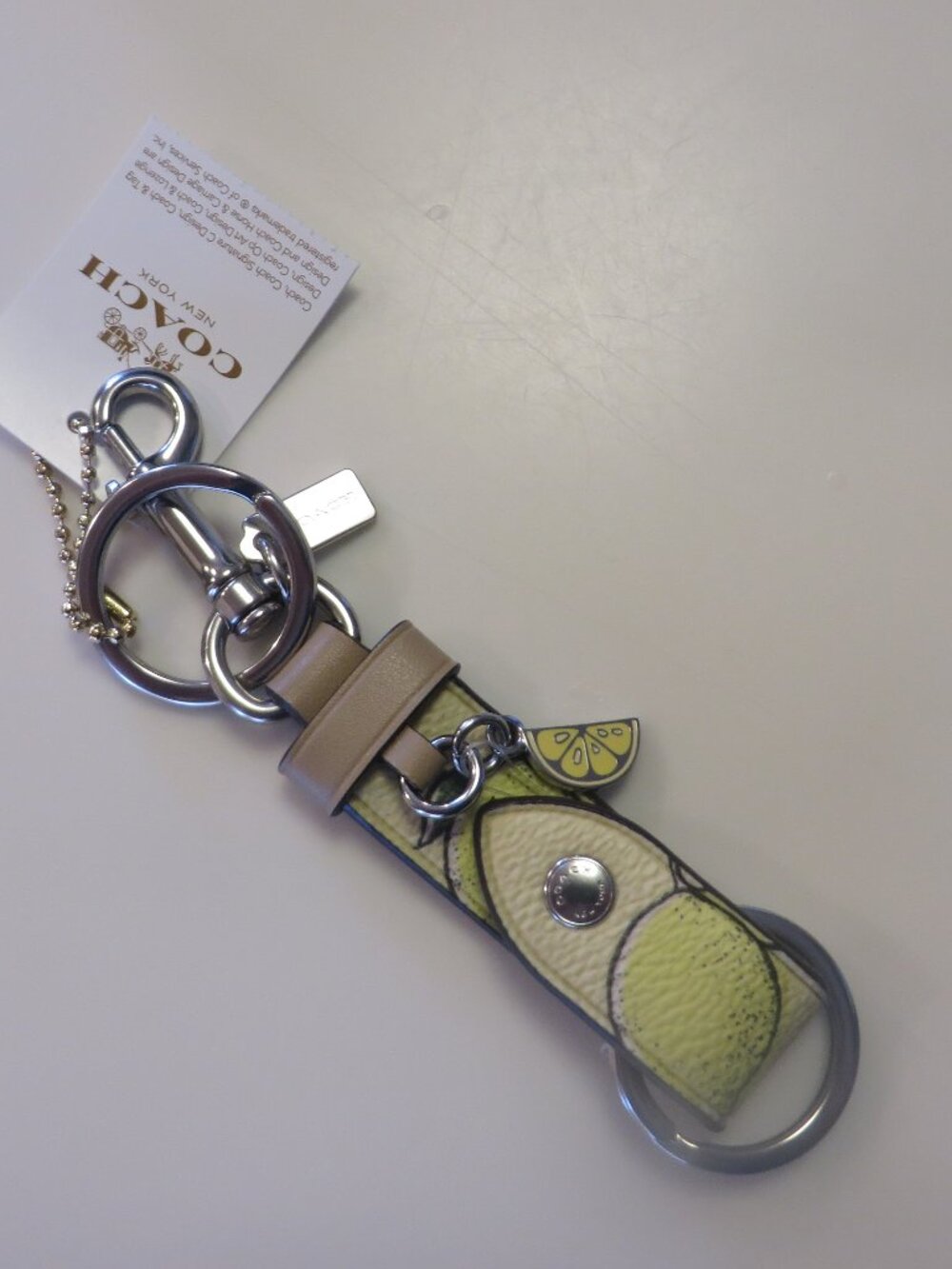 NWT Coach Trigger Snap Bag Charm with Lemon Print   Style  CAO47